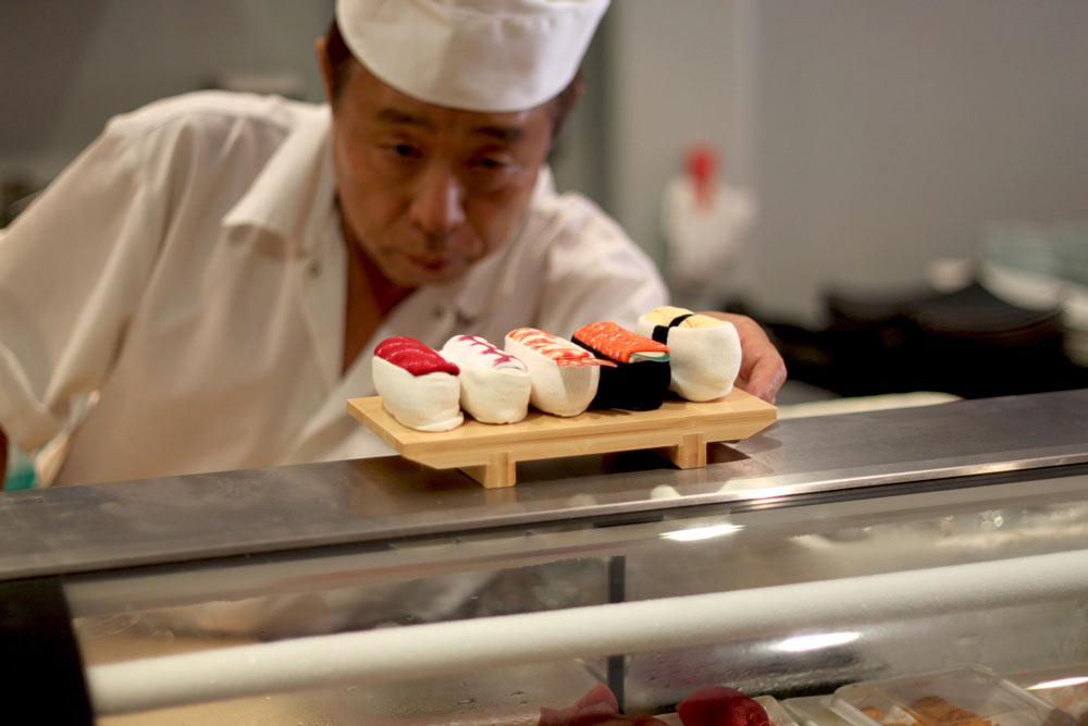 Master Sushi chef Ozasa check the quality of the sushi socks.